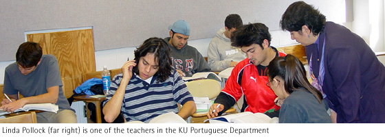 Picture of Linda Pollock, one of the teachers in the KU Portuguese Department, instructing students in class